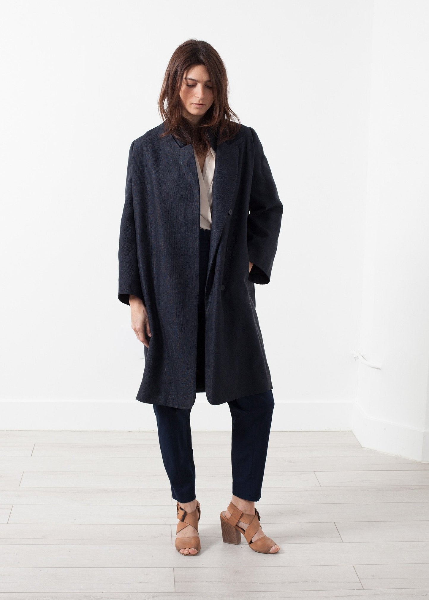 Manteau tissé à dos plissé