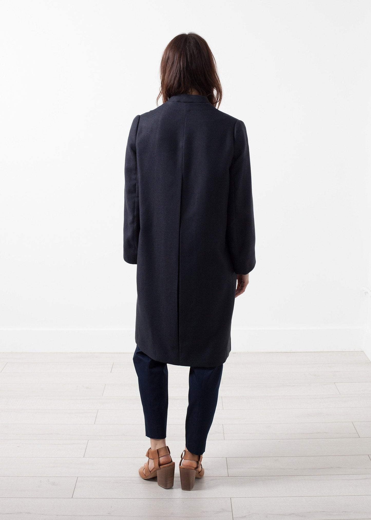 Manteau tissé à dos plissé